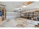 Spacious two-car garage with ample storage shelving for organized and secure parking at 743 Riverbend Blvd, Longwood, FL 32779