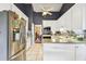 Spacious kitchen with stainless steel appliances and white cabinetry at 743 Riverbend Blvd, Longwood, FL 32779
