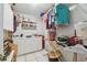 Functional laundry area with cabinets, shelving, and storage space for efficient organization at 743 Riverbend Blvd, Longwood, FL 32779
