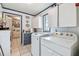 Functional laundry room equipped with washer and dryer at 743 Riverbend Blvd, Longwood, FL 32779
