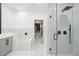 The luxurious bathroom has a glass-enclosed shower and large walk-in closet at 7633 Marietta St, Orlando, FL 32807