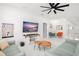Bright living room with tile floors, comfortable seating, and natural light at 7633 Marietta St, Orlando, FL 32807
