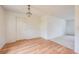 Bright room with wood laminate flooring, a chandelier light fixture, and neutral walls at 858 Darwin Dr, Altamonte Springs, FL 32701