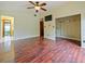 Inviting bedroom with hardwood floors, walk-in closet, providing a spacious and functional area at 872 Huckleberry Ln, Winter Springs, FL 32708