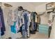 Walk-in closet with ample hanging space and storage options at 10012 Lovegrass Ln, Orlando, FL 32832