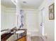 Bathroom featuring a vanity with a dark countertop, toilet, and a shower with a curtain and glass door at 1025 Sandy Ridge Dr, Davenport, FL 33896