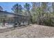 The screened in pool features lounge chairs for sunbathing at 1025 Sandy Ridge Dr, Davenport, FL 33896