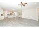 Spacious living room area leading to the kitchen at 1038 Dennis Ave, Orlando, FL 32807