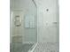 Spacious shower stall with elegant tile work, modern fixtures, and glass enclosure at 1038 Dennis Ave, Orlando, FL 32807