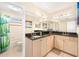 Bathroom featuring granite countertop and tile surround at 11234 Willow Gardens Dr, Windermere, FL 34786