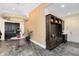 Grand foyer with marble floors, a statement light fixture, and custom built-in storage at 13319 Alderley Dr, Orlando, FL 32832