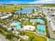 Aerial view showcasing community amenities including the pools and recreation areas at 13864 Sachs Ave, Orlando, FL 32827