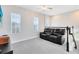 Cozy upstairs loft area with comfortable seating and natural light at 13875 Sachs Ave, Orlando, FL 32827