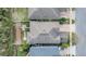 Aerial view of a home, showcasing the roof and surrounding landscape, highlighting its position within a residential area at 14150 Aldford Dr, Winter Garden, FL 34787