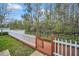 Backyard deck with lawn and fencing at 14150 Aldford Dr, Winter Garden, FL 34787