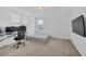 Bedroom featuring a work space, a minimalist platform bed, and carpet flooring at 14150 Aldford Dr, Winter Garden, FL 34787