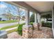 Charming front porch featuring stone accents and a brick walkway, offering a relaxing outdoor space at 14150 Aldford Dr, Winter Garden, FL 34787