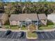 Aerial view of a two-story apartment complex with parking at 145 Reserve Cir # 113, Oviedo, FL 32765