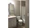 A bathroom has a vanity with a white sink and a shower-tub combo at 145 Reserve Cir # 113, Oviedo, FL 32765