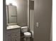 A bathroom has a vanity with a white sink and a shower-tub combo at 145 Reserve Cir # 113, Oviedo, FL 32765