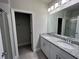 Dual-sink bathroom with granite countertops and modern fixtures at 1522 Bantam Way, Winter Park, FL 32792