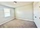 Cozy bedroom featuring neutral walls, carpet flooring and a bright window at 1522 Bantam Way, Winter Park, FL 32792