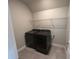 Functional laundry room featuring modern washer and dryer at 1522 Bantam Way, Winter Park, FL 32792