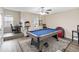 Bonus room with a pool table, gaming setup, and plenty of space for recreation at 1700 Leatherback Ln, St Cloud, FL 34771