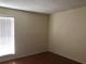 Bright bedroom with a large window, providing ample natural light and a spacious area at 1909 Caralee Blvd # 4, Orlando, FL 32822