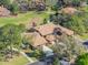 An aerial view showcases the home's beautiful architecture and meticulously maintained landscaping at 193 Heron Bay Cir # 8, Lake Mary, FL 32746