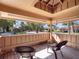 Charming screened-in porch features a cozy seating area and a relaxing atmosphere at 193 Heron Bay Cir # 8, Lake Mary, FL 32746