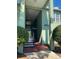 Inviting entryway to a well-maintained building with greenery, providing a welcoming first impression at 2025 Dixie Belle Dr # 2025 B, Orlando, FL 32812