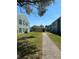 Well-maintained complex buildings with green spaces and walkways create an inviting atmosphere at 2025 Dixie Belle Dr # 2025 B, Orlando, FL 32812
