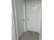 View of two white doors in the hallway of the home at 2025 Dixie Belle Dr # 2025, Orlando, FL 32812