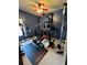 Home gym with a weight rack and other exercise equipment at 214 Great Yarmouth Ct, Kissimmee, FL 34758