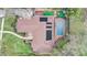 Aerial view of a home with a private pool, solar panels, and landscaped backyard at 2227 Palm Vista Dr, Apopka, FL 32712