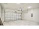 Spacious two-car garage with block walls, concrete floor and overhead door at 2246 Sw 167Th Pl, Ocala, FL 34475