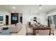Inviting living and dining area with modern furnishings and an open kitchen with stainless steel appliances at 2246 Sw 167Th Pl, Ocala, FL 34475