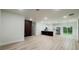 Spacious open floor plan with kitchen featuring a center island and stainless steel appliances at 2246 Sw 167Th Pl, Ocala, FL 34475