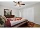 Bedroom with a closet, dresser with mirror and a bed with patterned quilt at 2251 Chippewa Trl, Maitland, FL 32751