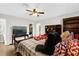 Bedroom featuring a TV, a book shelf, a bed, and a view of a closet at 2251 Chippewa Trl, Maitland, FL 32751