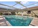 Inviting pool with screened enclosure, adjacent to the outdoor living spaces at 2251 Chippewa Trl, Maitland, FL 32751