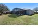 Expansive backyard with a screened-in porch perfect for outdoor entertaining at 2732 Aloma Oaks Dr, Oviedo, FL 32765