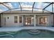 Backyard pool and patio with a covered lanai at 2732 Aloma Oaks Dr, Oviedo, FL 32765