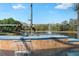 Outdoor pool featuring a water feature and a view of the lake at 2732 Aloma Oaks Dr, Oviedo, FL 32765