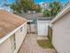 Aerial view of the fenced backyard, shed, and single-story home at 310 Sunvista Ct, Sanford, FL 32773