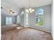 Inviting living room featuring large windows, a vaulted ceiling and neutral colors at 310 Sunvista Ct, Sanford, FL 32773