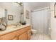 Cozy bathroom with a vanity, toilet, and shower featuring a neutral color palette at 314 Silk Oak Dr, Kissimmee, FL 34743