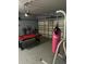 Garage space with a pool table, punching bag, and storage at 547 Madina Cir, Davenport, FL 33837