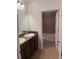 Bathroom featuring a double sink vanity, tiled floors, and a bath and shower combo at 622 Samuel Pl, Davenport, FL 33837